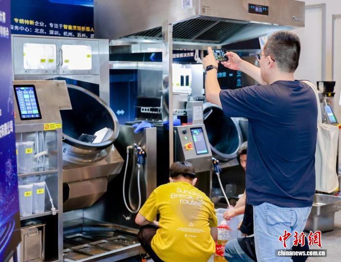 首届中国炒菜机器人大赛北京平谷举办 智慧餐饮赋能食品产业升级