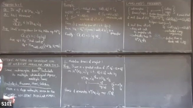 Motivic action on coherent cohomology of Hilbert modular