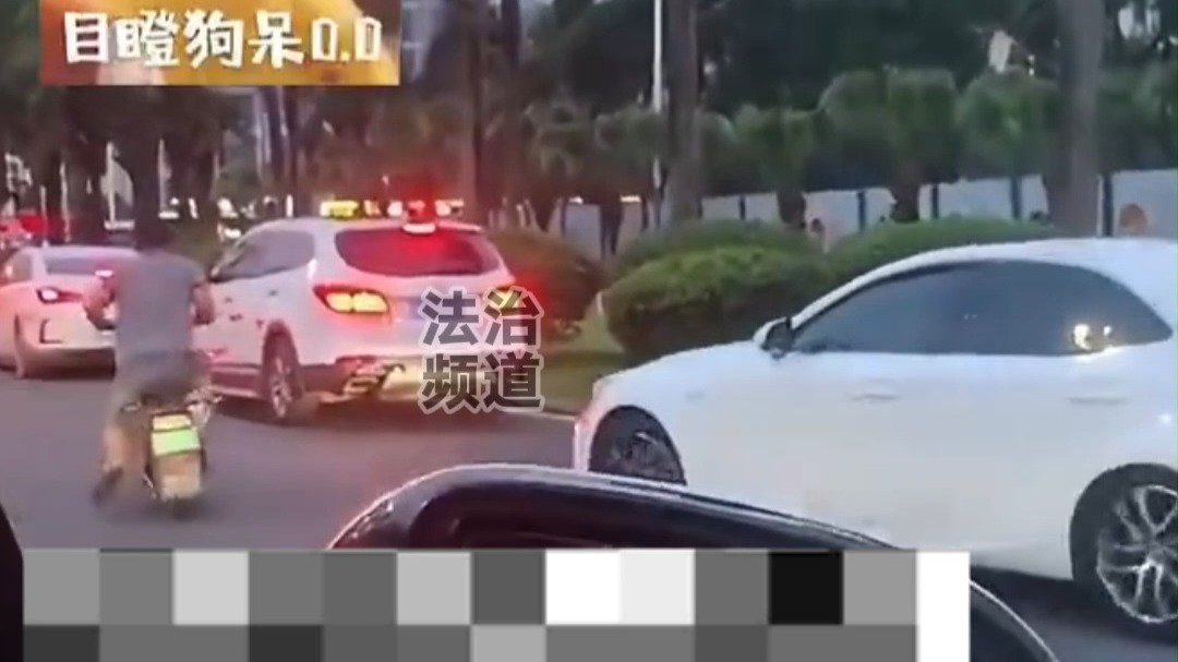 司机欲撞砸车电动车主 下一秒恢复理智停下 网友：那一瞬间 他