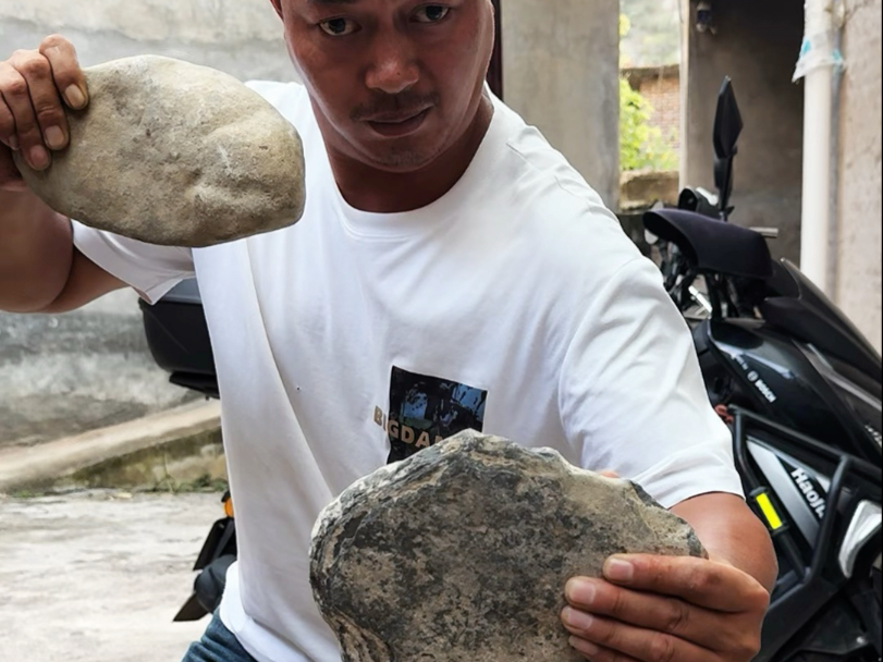 猛男拳劈硬石头